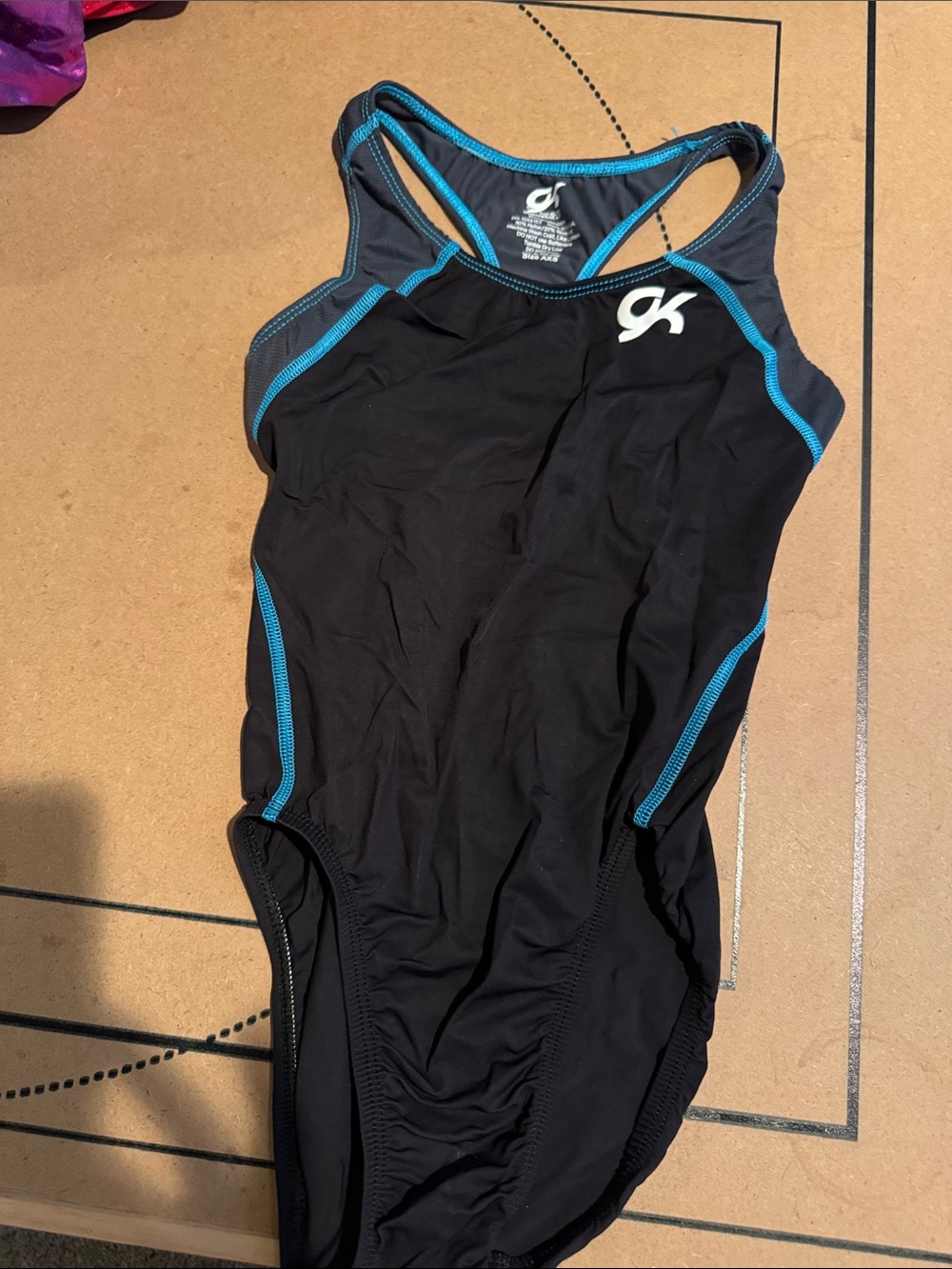 GK Black One-Piece Swimsuit with Blue Accents
